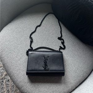 Saint Laurent black mini bag with black chain and black logo